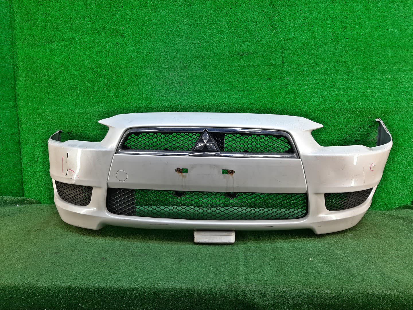 Бампер передний MITSUBISHI LANCER, GALANT FORTIS CY4A, CY2A, CY3A, CY6A, CX6A, CX4A, CX3A 8701 1 ракурс
