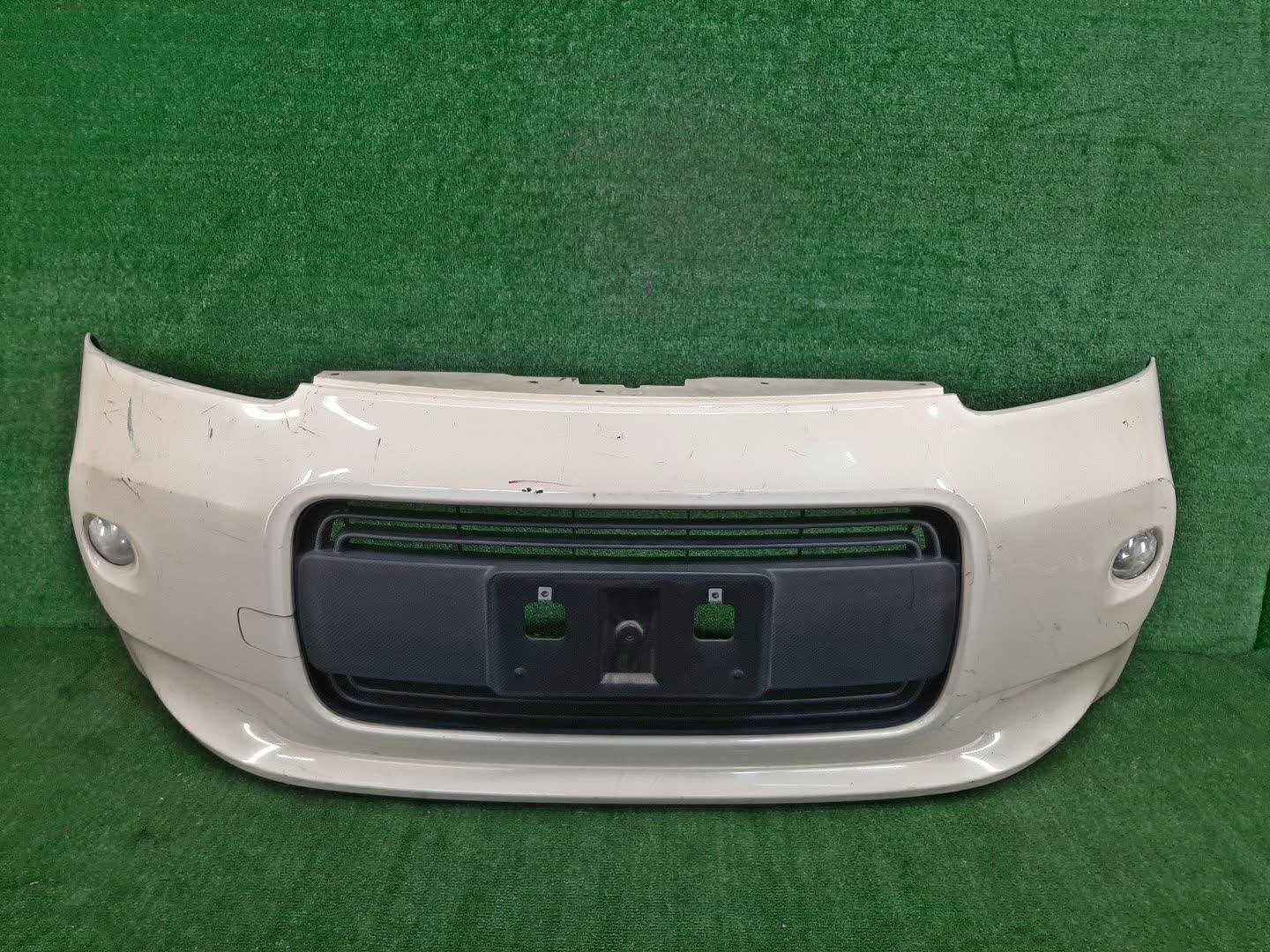 Бампер передний TOYOTA PORTE NCP141 76735 1 ракурс
