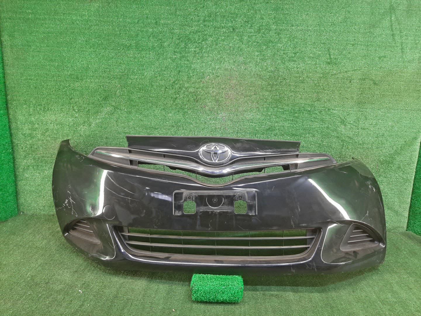 Бампер передний TOYOTA RACTIS NCP120, NCP122, NCP125, NSP120, NSP122 77401 1 ракурс