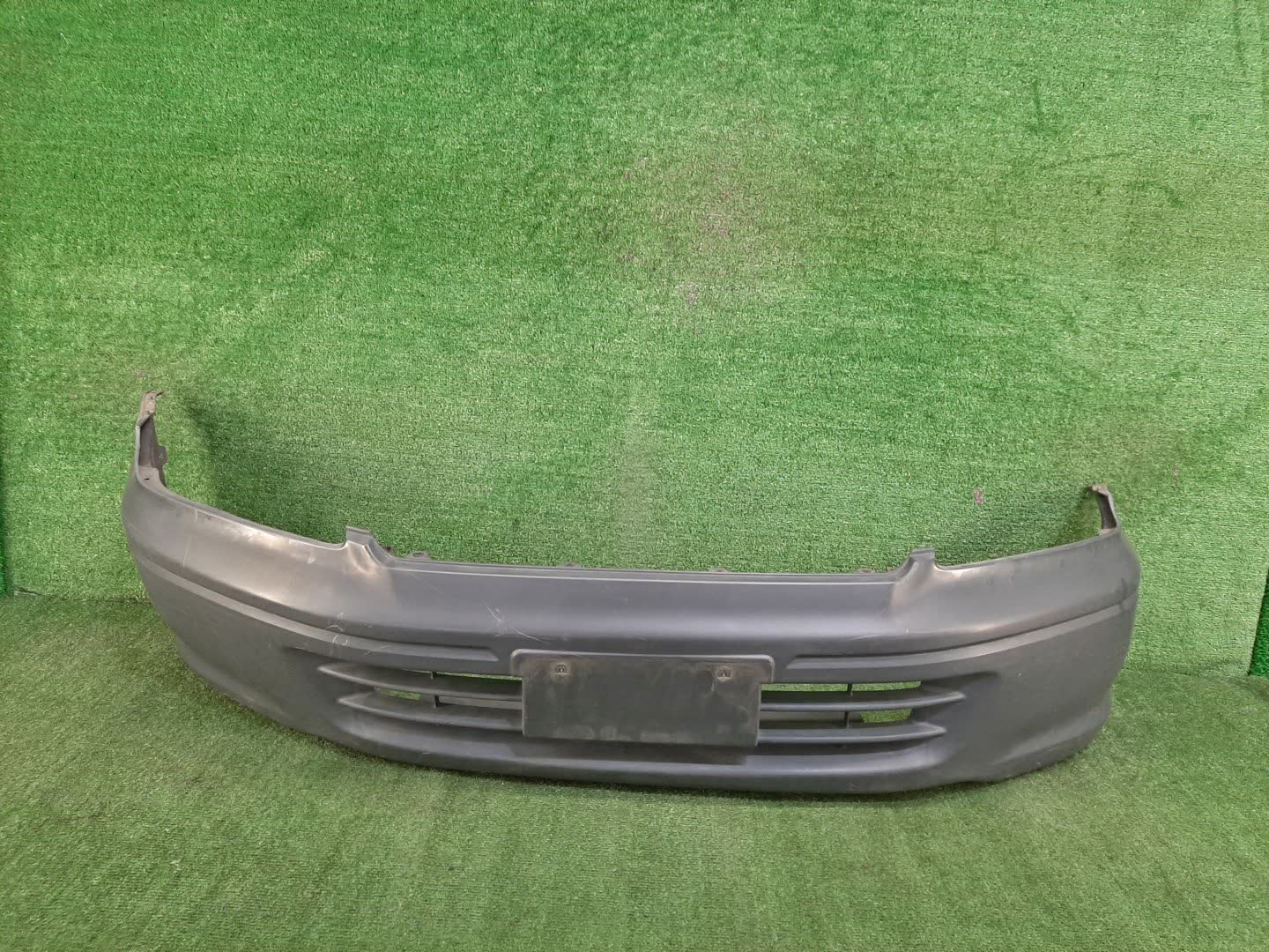 Бампер передний MITSUBISHI LANCER CEDIA, LANCER CS2A, CS5W, CS5A, CS3W, CS9W, CS9A, CS1A, CS2W, CS2V, CS3A, CS6A 77654 1 ракурс
