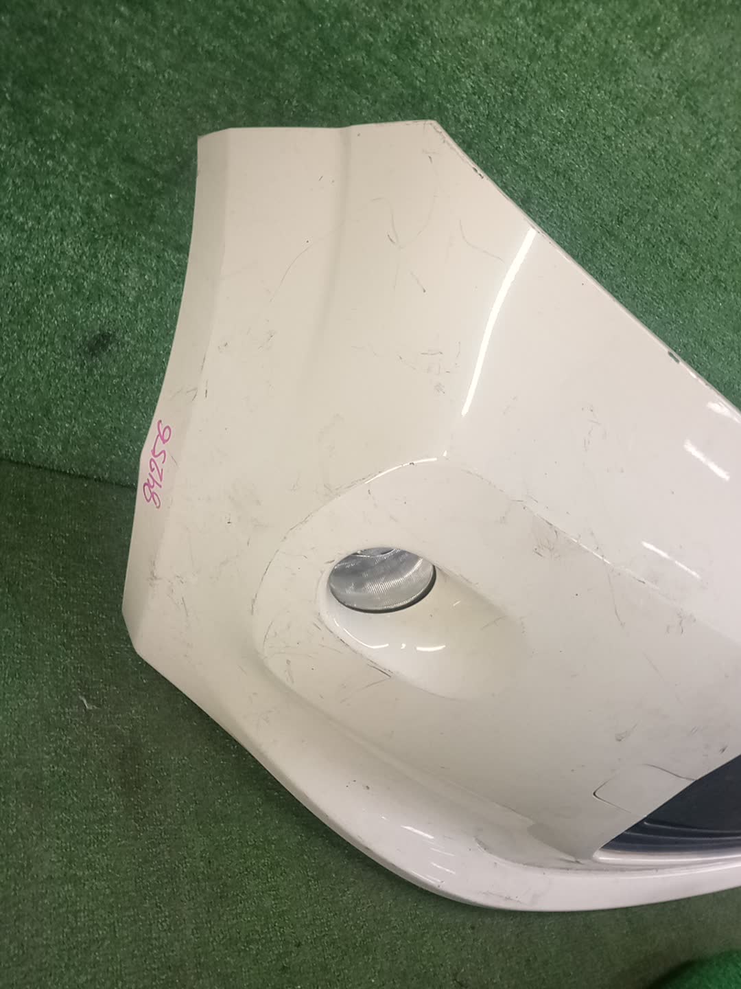 Бампер передний TOYOTA PORTE NCP141 84256 2 ракурс