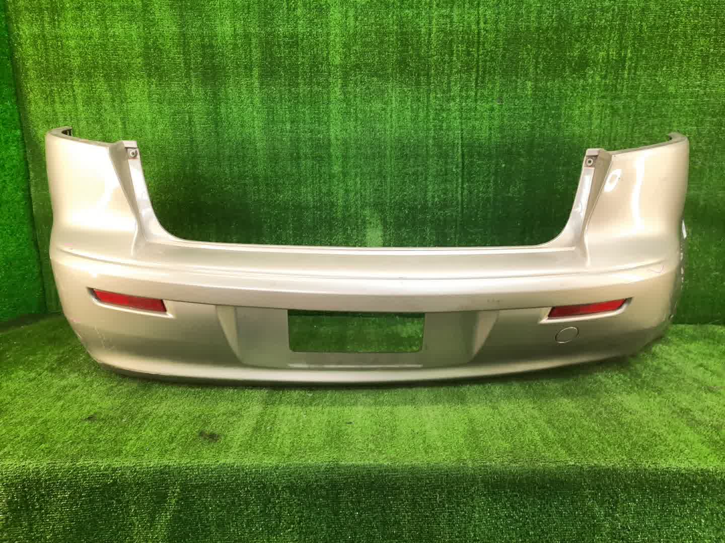 Бампер задний MITSUBISHI LANCER, GALANT FORTIS CY4A, CY2A, CY3A, CY6A 86100 1 ракурс