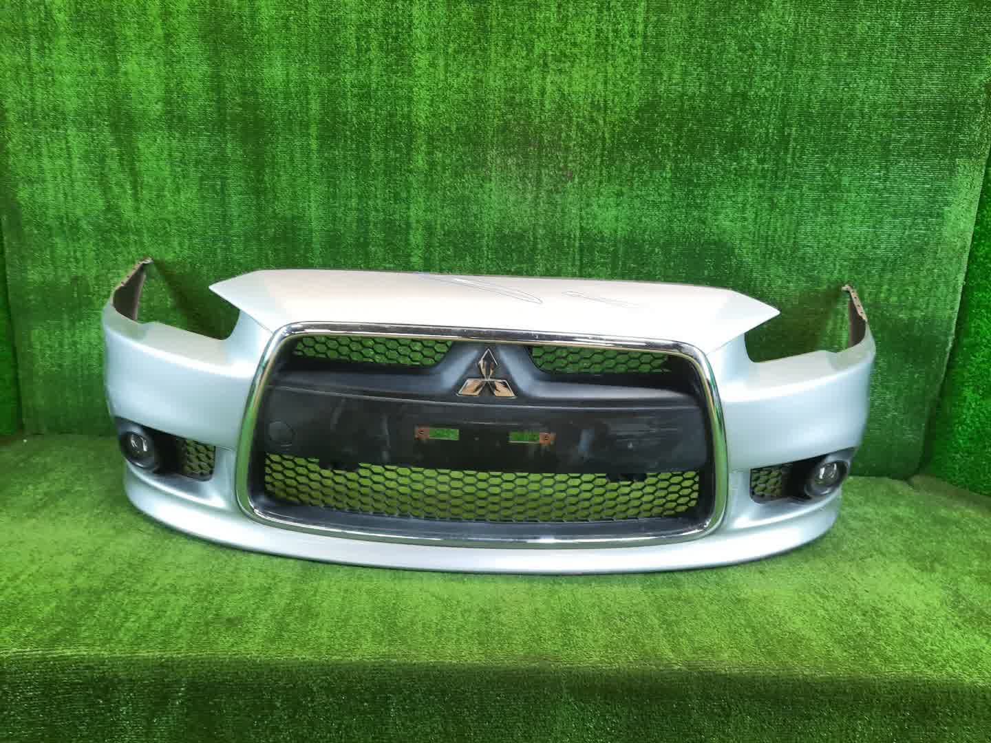 Бампер передний MITSUBISHI LANCER, GALANT FORTIS CY4A, CY2A, CY3A, CY6A, CX6A, CX4A, CX3A 2403 1 ракурс