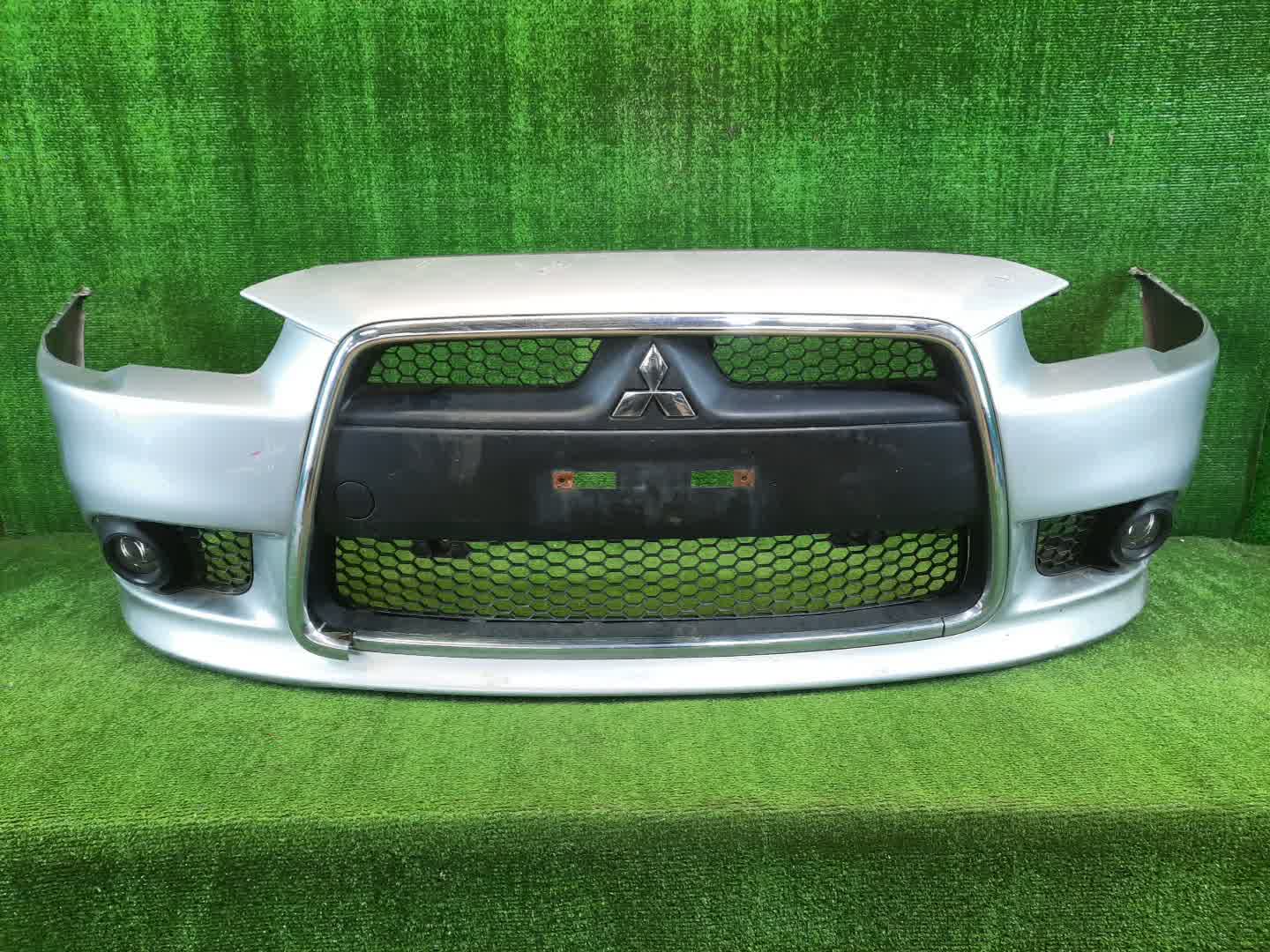 Бампер передний MITSUBISHI LANCER, GALANT FORTIS CY4A, CY2A, CY3A, CY6A, CX6A, CX4A, CX3A 4048 1 ракурс
