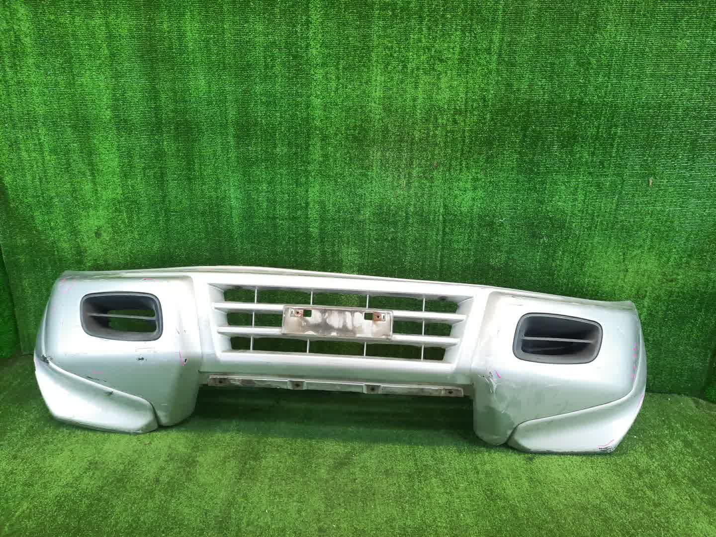 Бампер передний MITSUBISHI PAJERO V75W, V65W, V78W, V73W, V77W, V63W, V68W 4615 1 ракурс