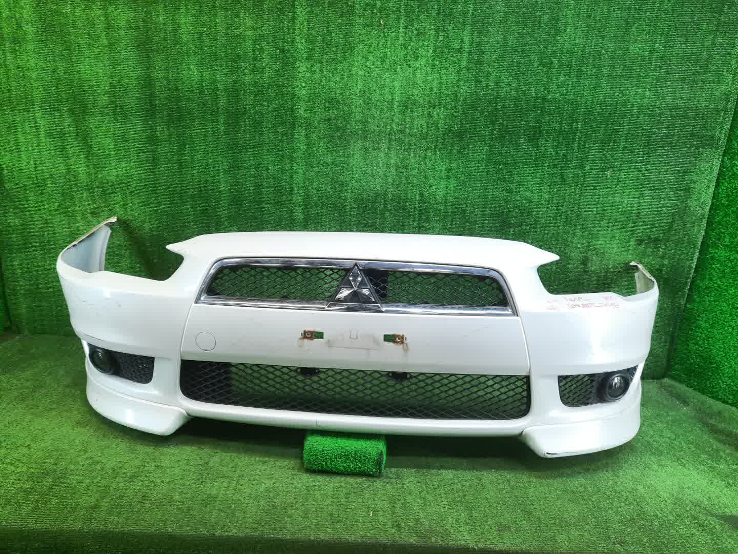 Бампер передний MITSUBISHI LANCER, GALANT FORTIS CY4A, CY2A, CY3A, CY6A, CX6A, CX4A, CX3A 6945 1 ракурс