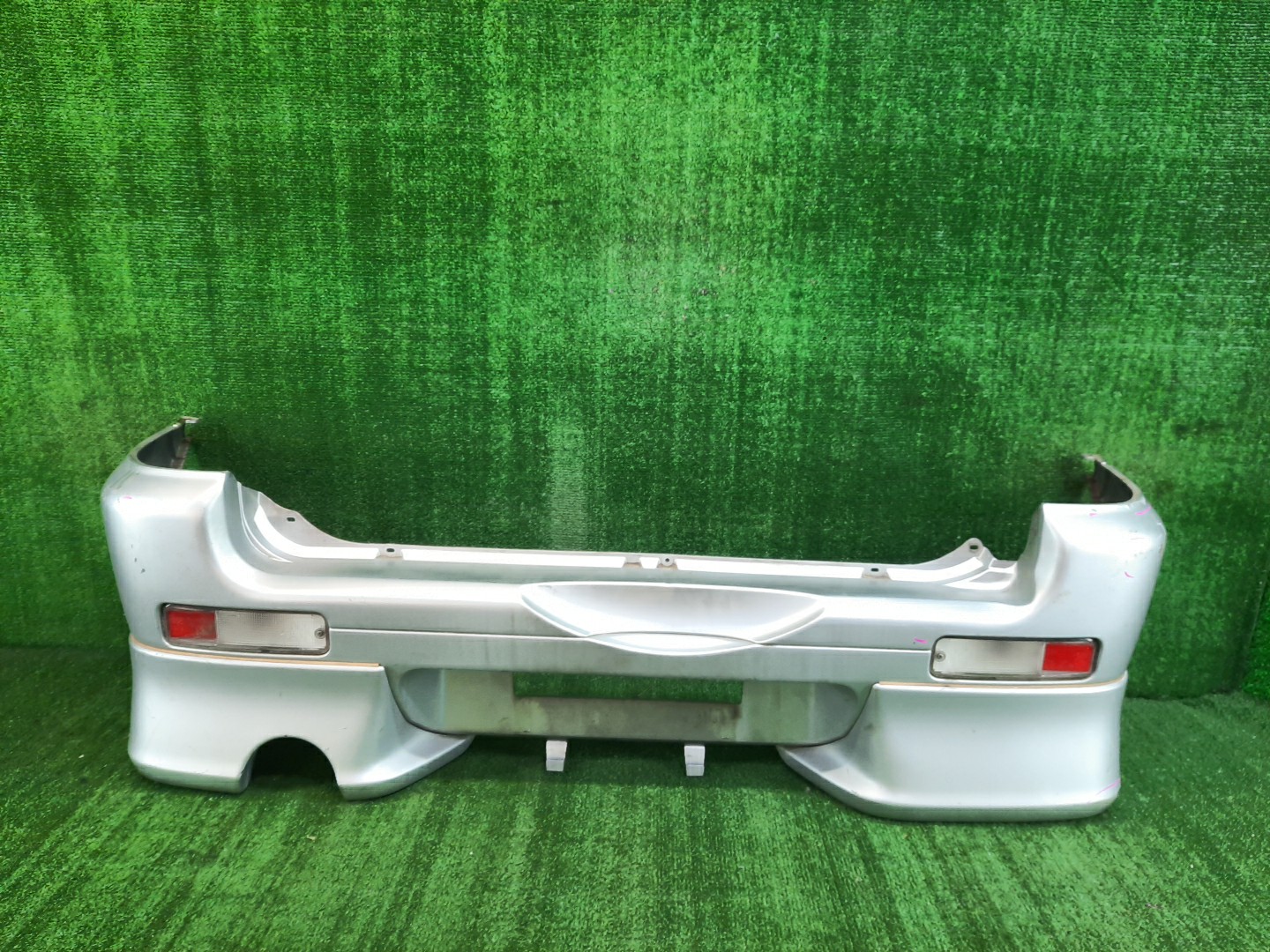 Бампер задний DAIHATSU TERIOS, CAMI J100G, J102G, J100E, J102E, J122E 8512 1 ракурс