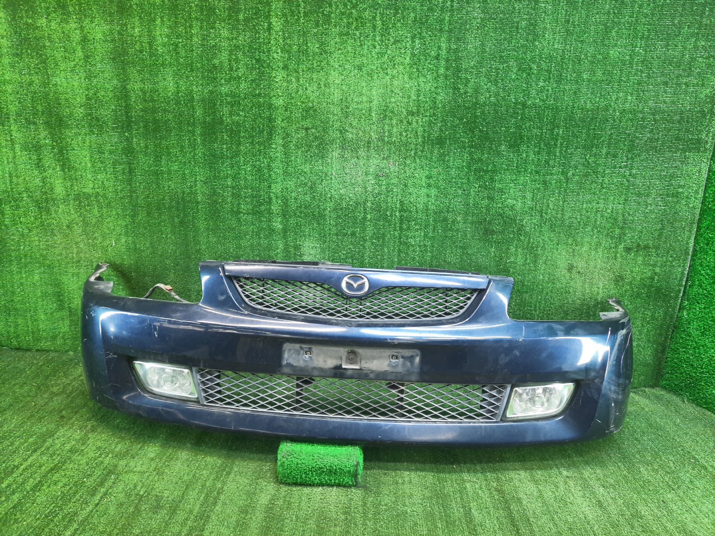 Бампер передний MAZDA FAMILIA, 323 BJ5W, BJ5P, BJEP, BJFW, BJ8W, BJ3P, BJFP, BJ 8760 1 ракурс