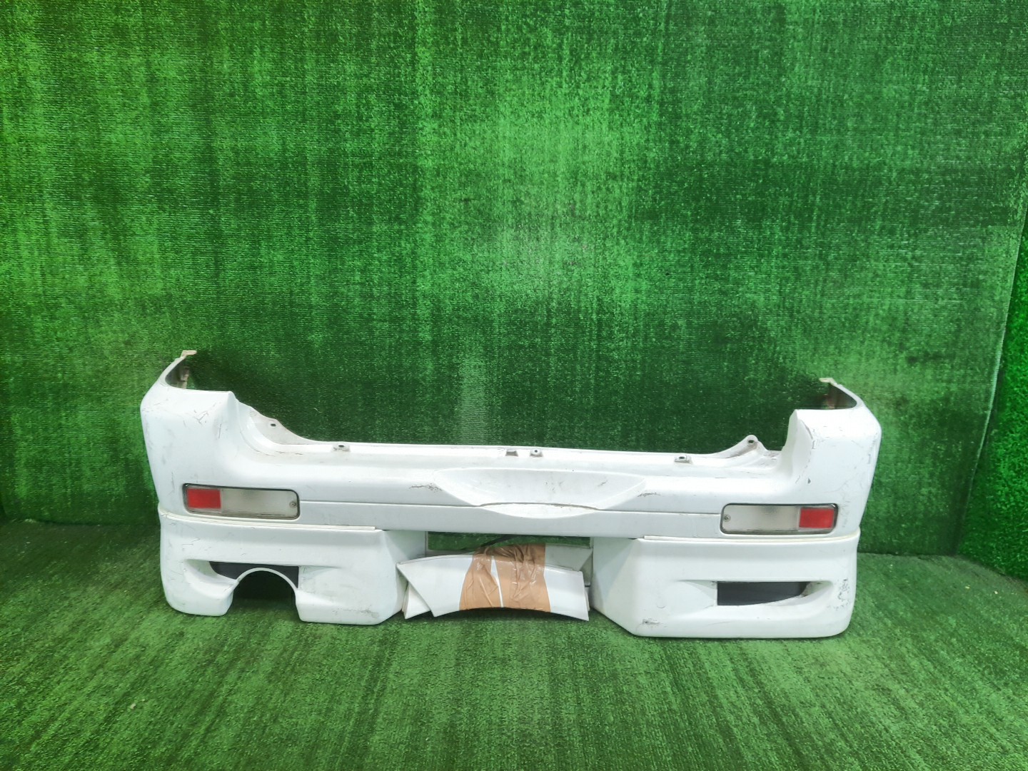 Бампер задний TOYOTA TERIOS, CAMI J100G, J102G, J100E, J102E, J122E 9858 1 ракурс