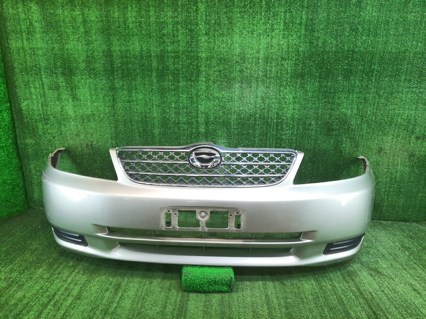 Бампер передний TOYOTA COROLLA, COROLLA FIELDER ZZE124, NZE121, NZE120, ZZE122, NZE124, CE121, NZE121G, ZZE123G, ZZE124G, ZZE122G, NZE124G 10210 1 ракурс