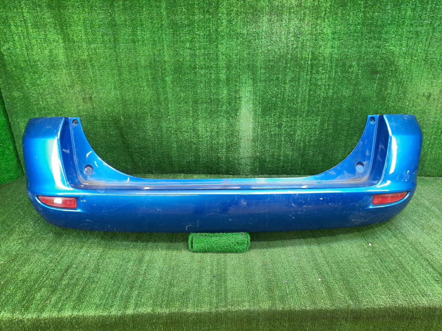 Бампер задний MAZDA DEMIO DY3W, DY5W, DY3R 10705 1 ракурс