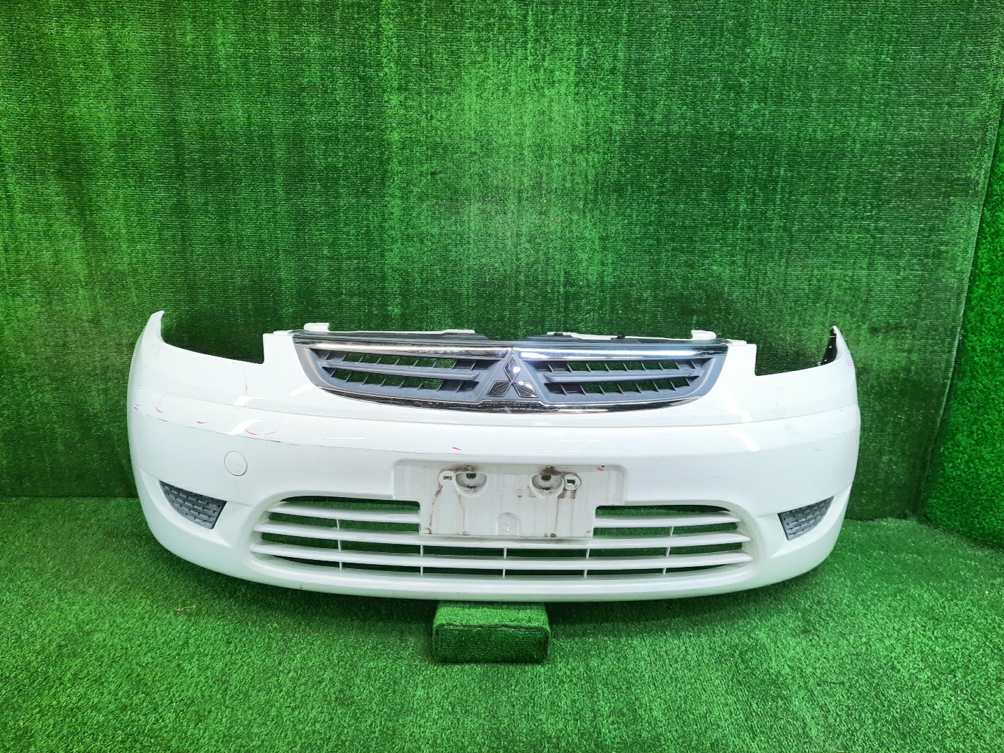 Бампер передний MITSUBISHI COLT PLUS, COLT Z27W, Z22W, Z25W, Z23W, Z24W, Z27WG, Z24A, Z23A, Z21A, Z25A, Z26A, Z27A, Z28A, Z22A 11574 1 ракурс