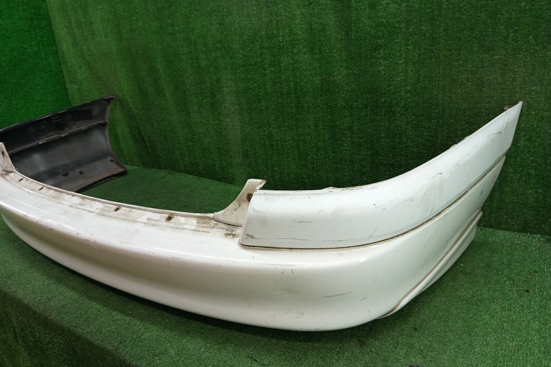 Бампер задний TOYOTA CALDINA ST215W, ST210G, ST215G, CT216, ST210, AT211, ST215, CT216G, AT211G 16349 2 ракурс Бампер задний TOYOTA CALDINA ST215W, ST210G, ST215G, CT216, ST210, AT211, ST215, CT216G, AT211G 16349 2 ракурс