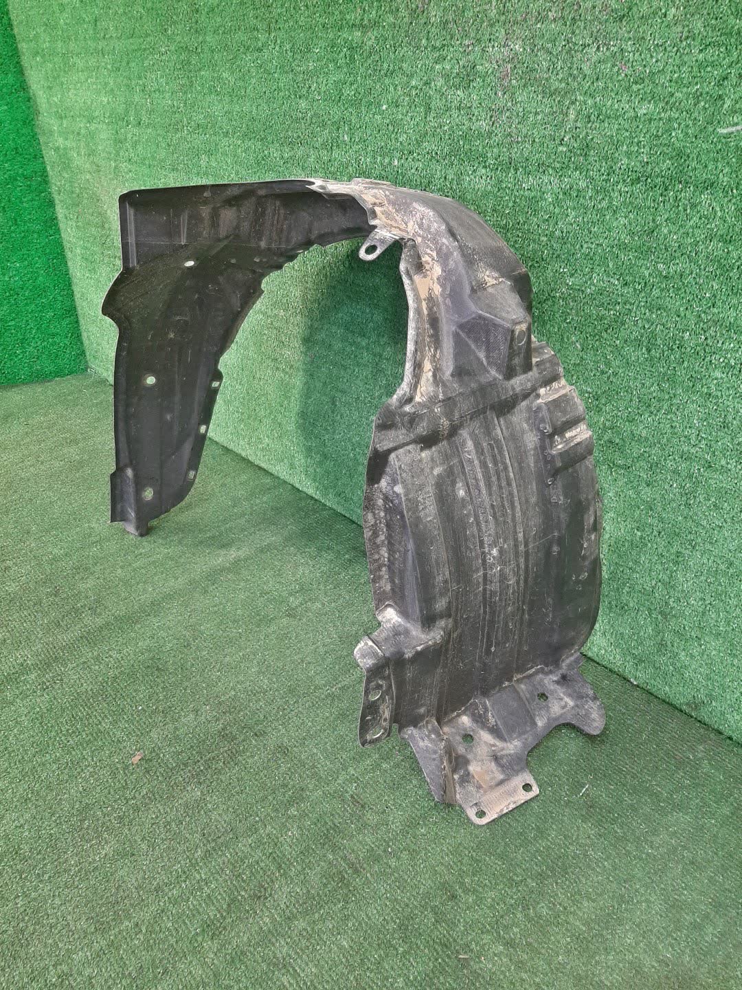 Защита под крыло левая передняя DAIHATSU BOON M710S 53876-B1110 1 ракурс