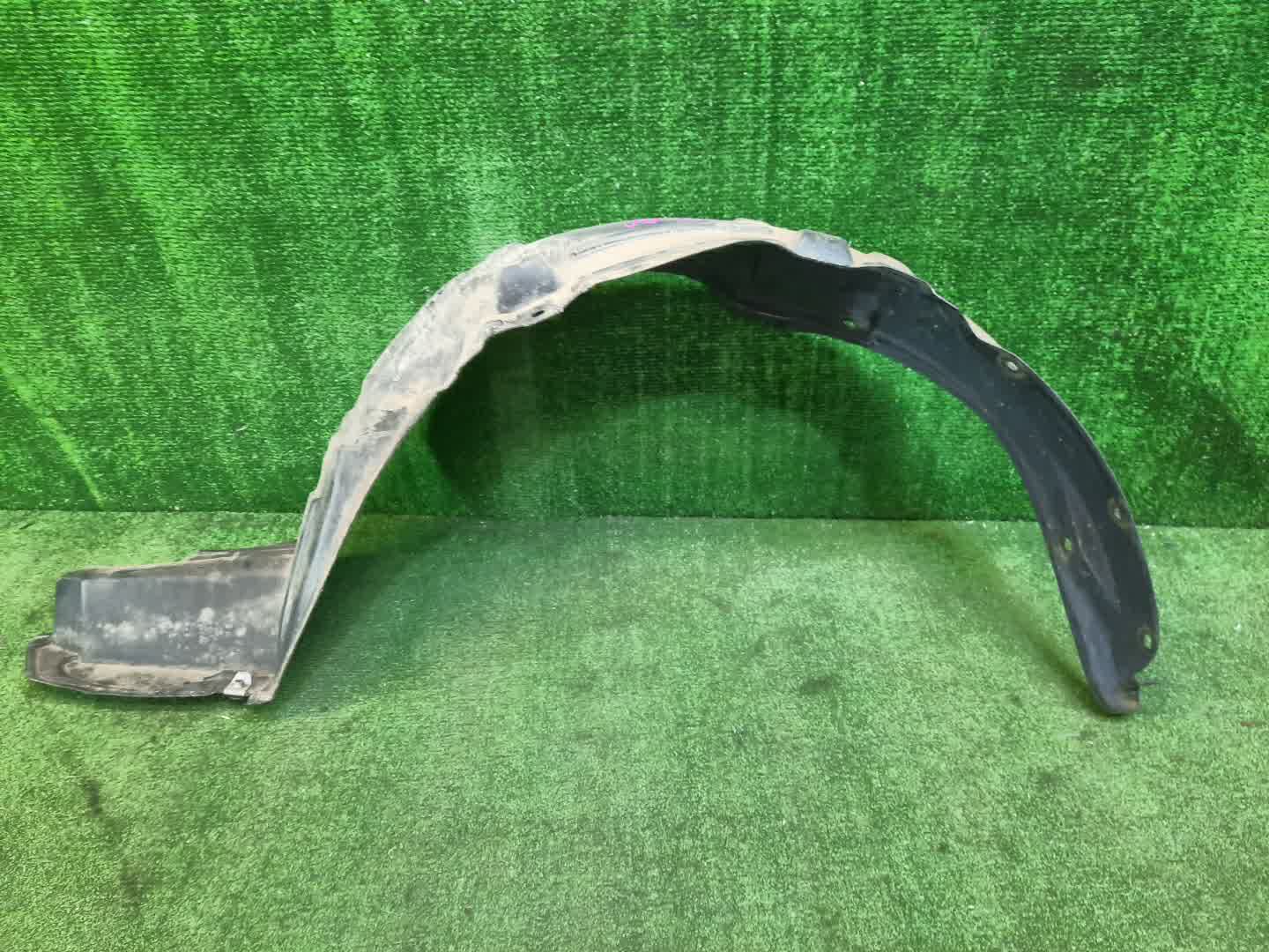 Защита под крыло левая передняя TOYOTA CORSA EL51 53876-16080 1 ракурс