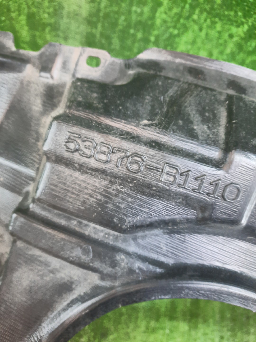 Защита под крыло левая передняя TOYOTA PASSO M700A 53876-B1110 2 ракурс