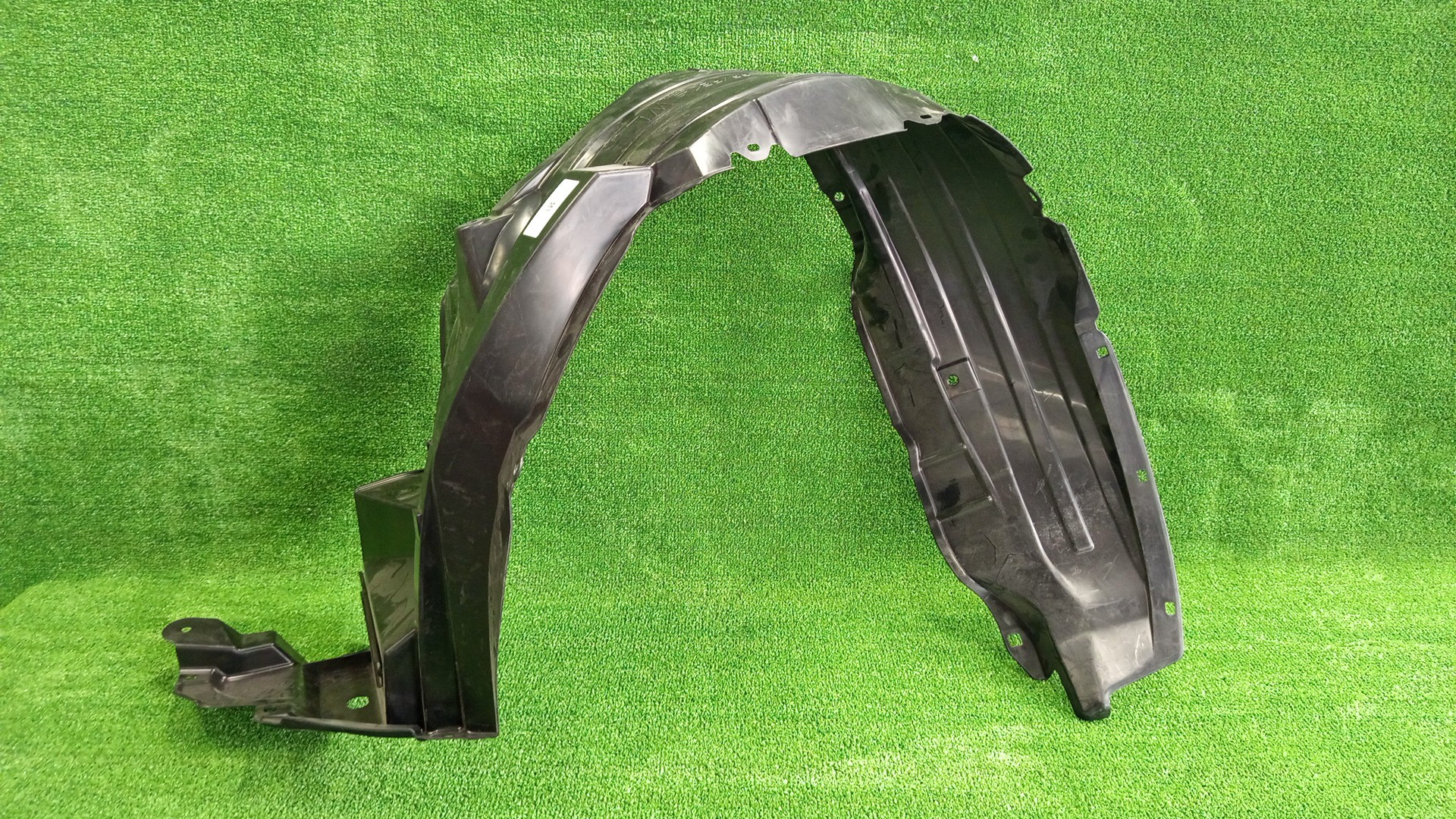 Защита под крыло левая передняя TOYOTA HILUX GUN125 53806-0K320 2 ракурс