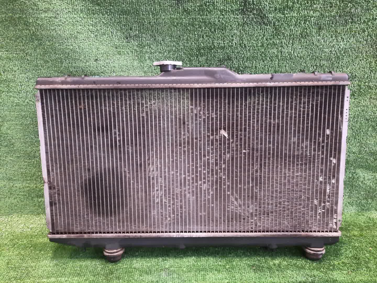 Радиатор основной TOYOTA SPRINTER CARIB, COROLLA, COROLLA LEVIN, COROLLA SPACIO, SPRINTER, SPRINTER TRUENO AE111G, AE110, EE102, EE103, AE111, AE111N 4A-FE, 5A-FE, 4E-FE, 5E-FE 2413 3 ракурс
