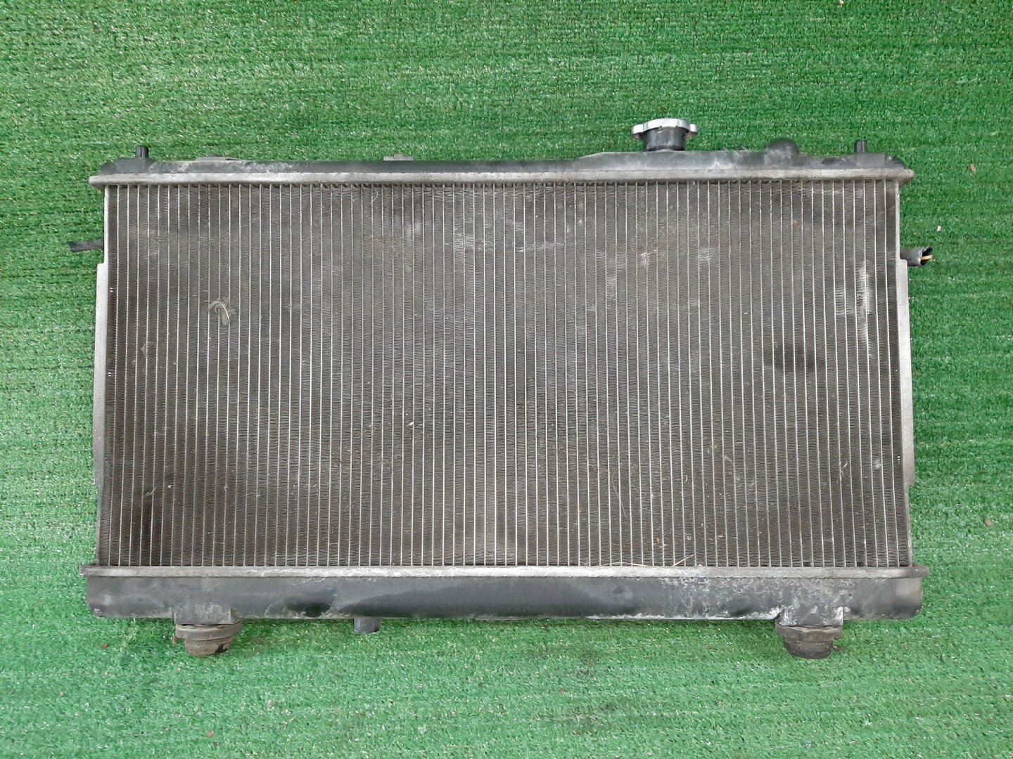 Радиатор основной MAZDA FAMILIA, 323 BJ5W, BJ5P, BJEP, BJFW, BJ8W, BJ3P, BJFP, BJ ZL-DE 4006 1 ракурс Радиатор основной MAZDA FAMILIA, 323 BJ5W, BJ5P, BJEP, BJFW, BJ8W, BJ3P, BJFP, BJ ZL-DE 4006 1 ракурс