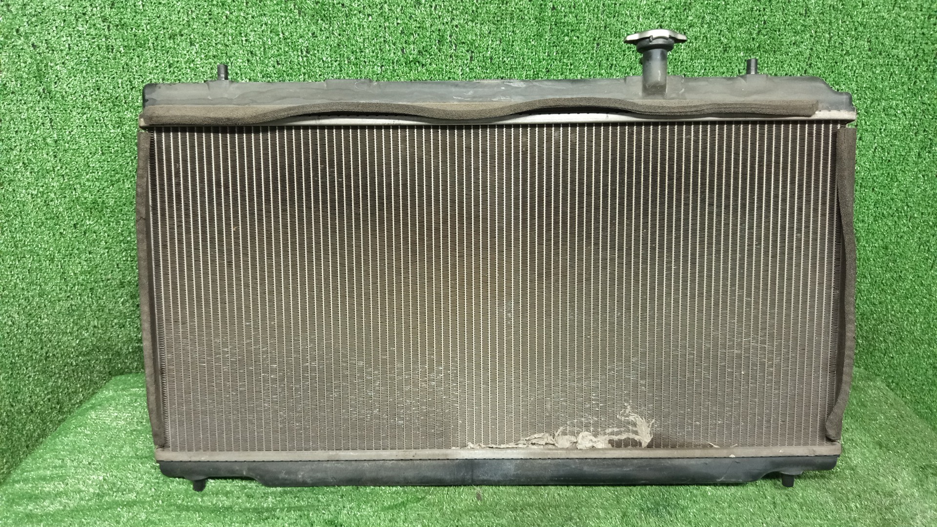Радиатор основной HONDA AIRWAVE GJ1, GJ2 L15A 6530 2 ракурс