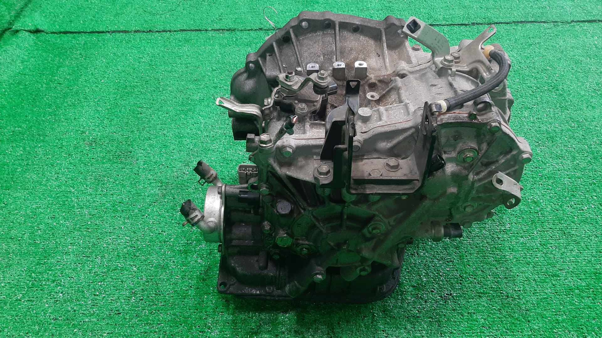АКПП TOYOTA PROBOX, COROLLA FIELDER, RACTIS, PORTE, SUCCEED, SPADE, TREZIA, COROLLA  AXIO NCP160V, NZE161G, NCP120, NCP122, NCP141, NZE161 1NZ-FE K310-02A 4 ракурс