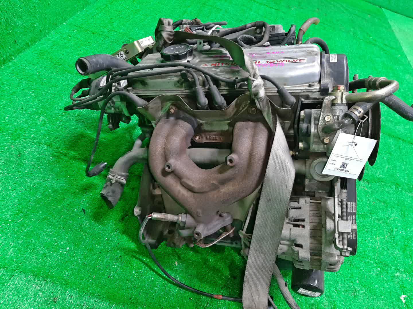 Двигатель MITSUBISHI LANCER CB2A 4G15 MVV 3 ракурс Двигатель MITSUBISHI LANCER CB2A 4G15 MVV 3 ракурс