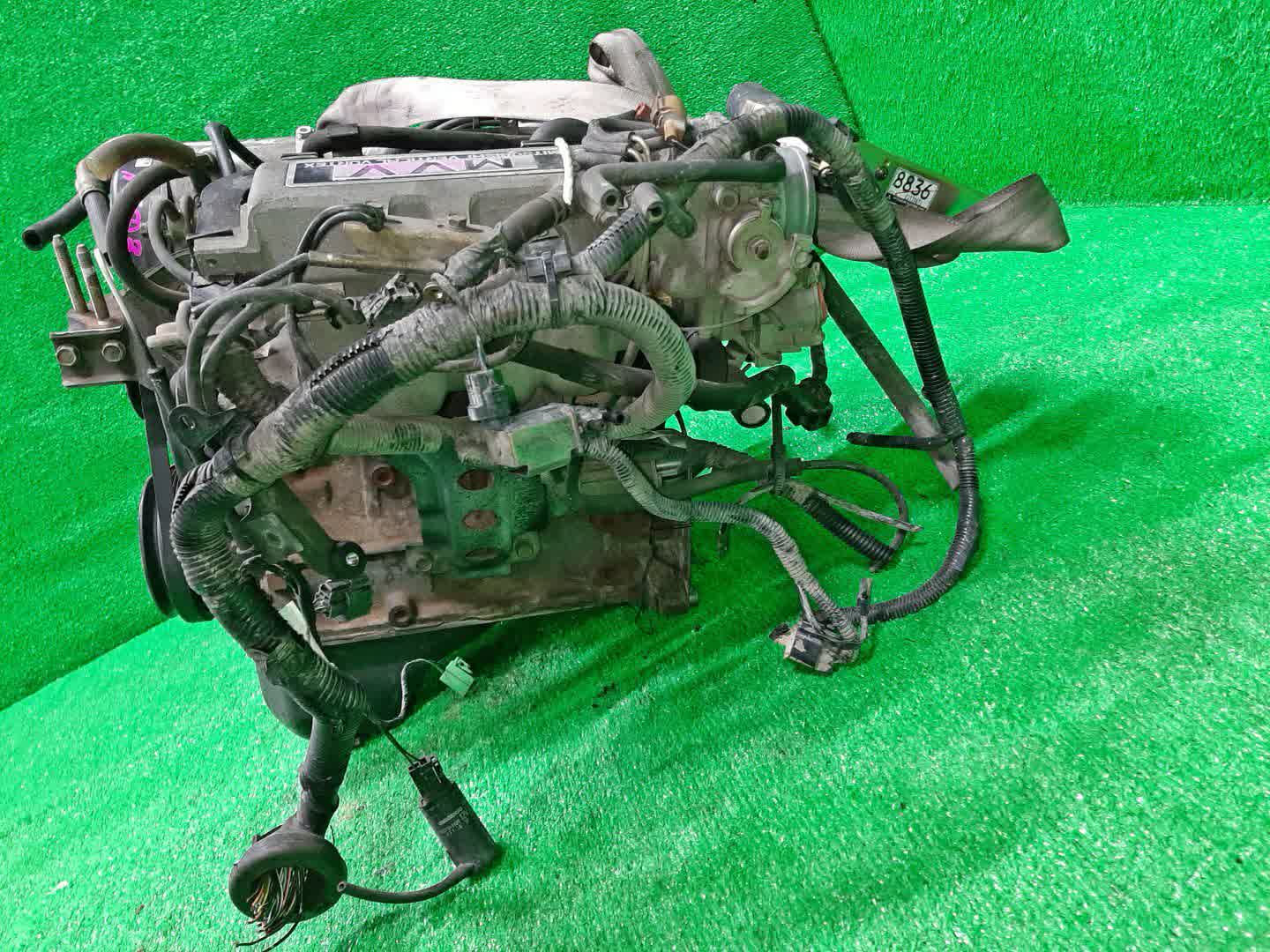 Двигатель MITSUBISHI LANCER CB2A 4G15 MVV 4 ракурс Двигатель MITSUBISHI LANCER CB2A 4G15 MVV 4 ракурс