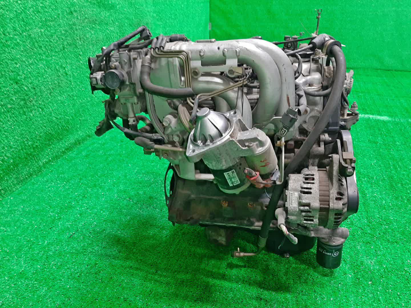 Двигатель MITSUBISHI LANCER CEDIA, LANCER, MIRAGE DINGO CS2A, CS2W, CS2V, CQ2A 4G15 HE GDI 3 ракурс Двигатель MITSUBISHI LANCER CEDIA, LANCER, MIRAGE DINGO CS2A, CS2W, CS2V, CQ2A 4G15 HE GDI 3 ракурс