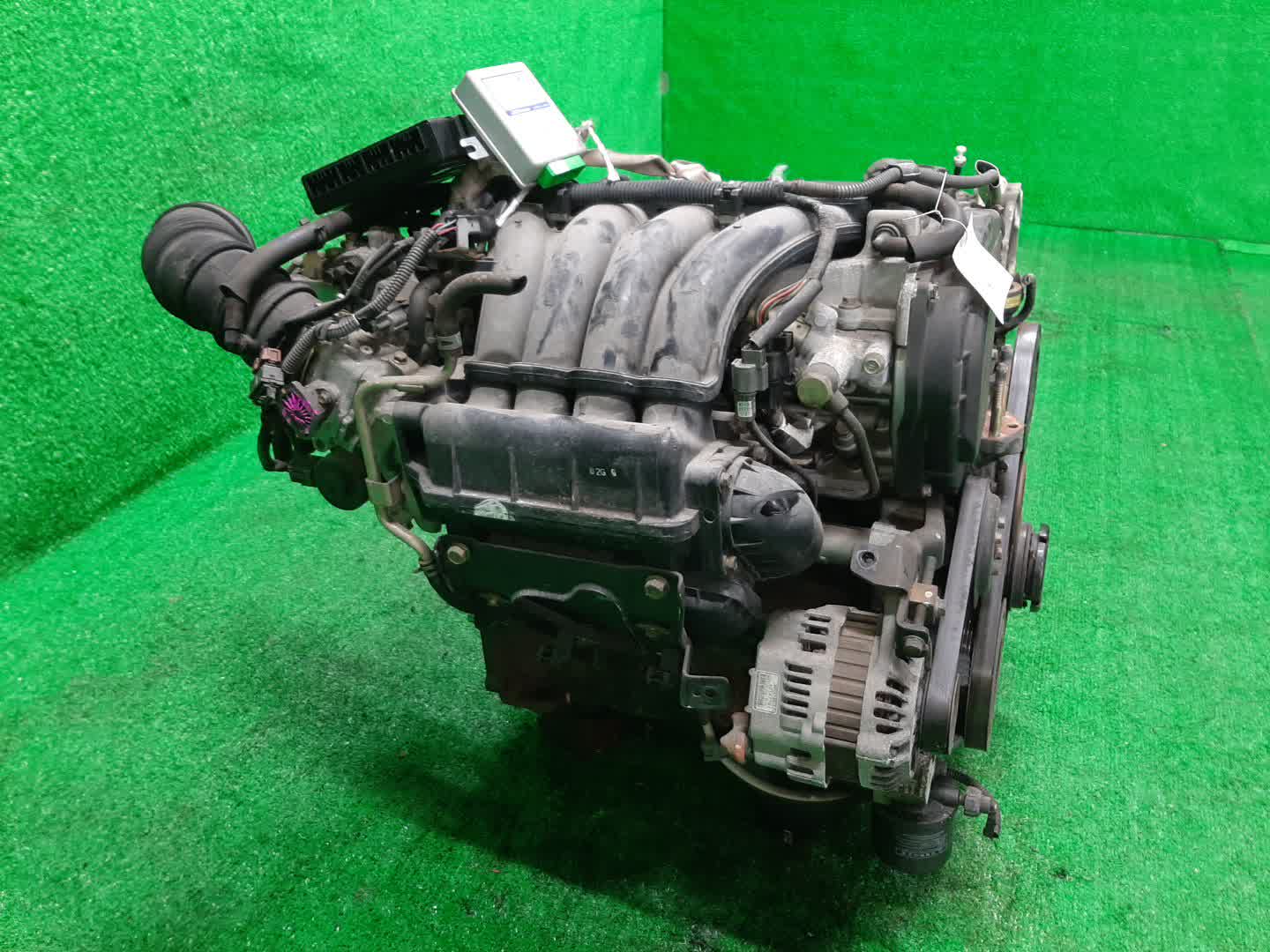 Двигатель MITSUBISHI CHARIOT GRANDIS N84W, N94W 4G64 MD373962 3 ракурс Двигатель MITSUBISHI CHARIOT GRANDIS N84W, N94W 4G64 MD373962 3 ракурс