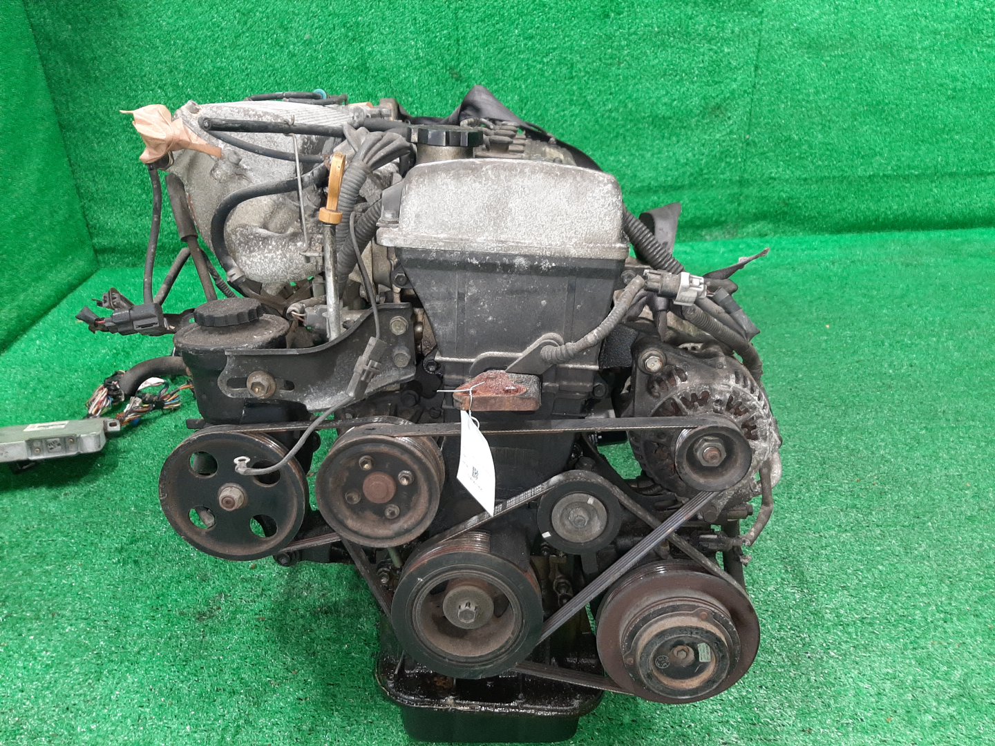 Двигатель TOYOTA CALDINA, CARINA, CORONA PREMIO AT191G, AT211G, AT191, AT211 7A-FE TPAM 2 ракурс