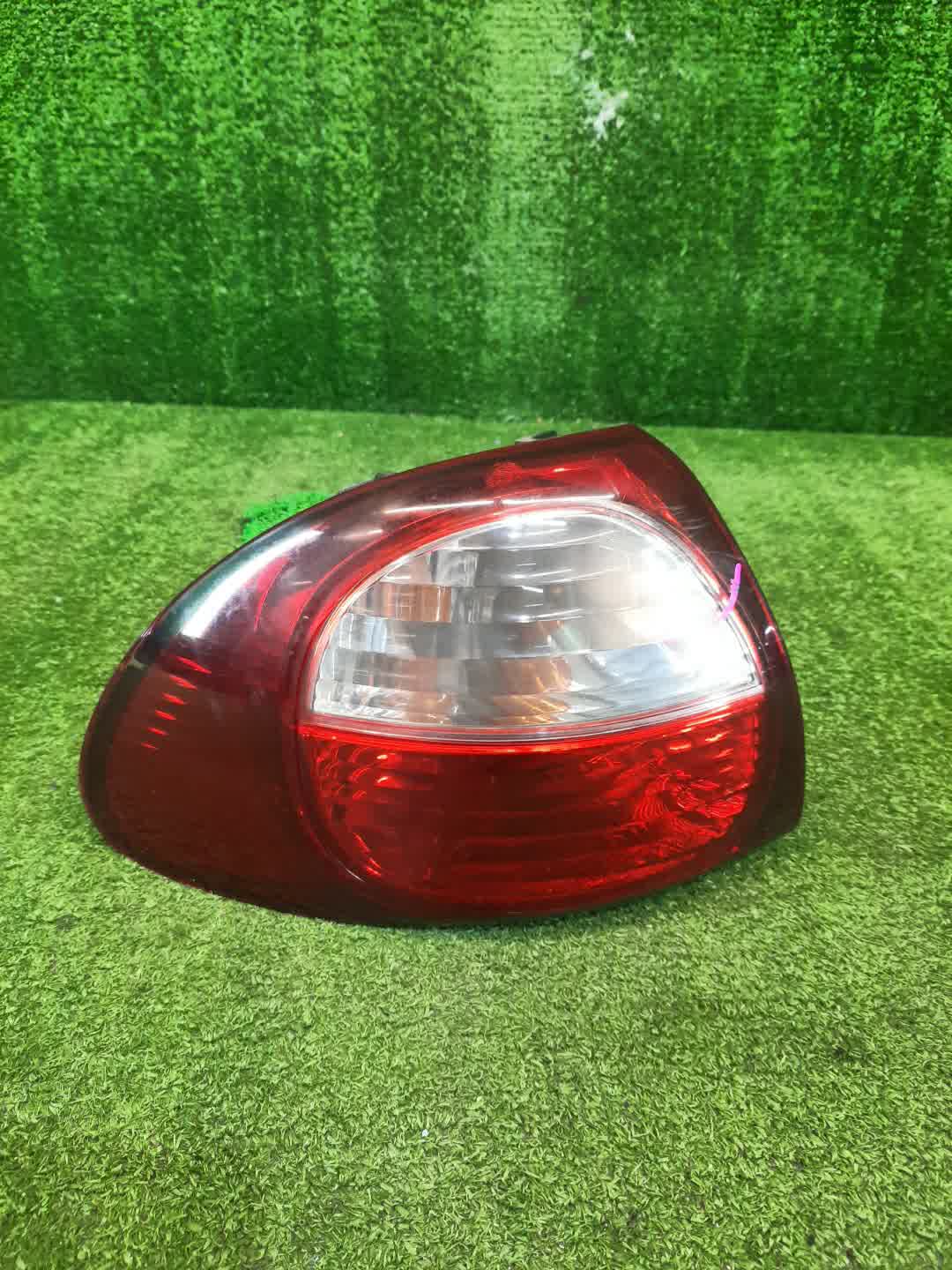 Стоп-сигнал левый задний TOYOTA CALDINA ST215W, ST210G, ST215G, CT216, ST210, AT211, ST215, CT216G, AT211G 1 ракурс
