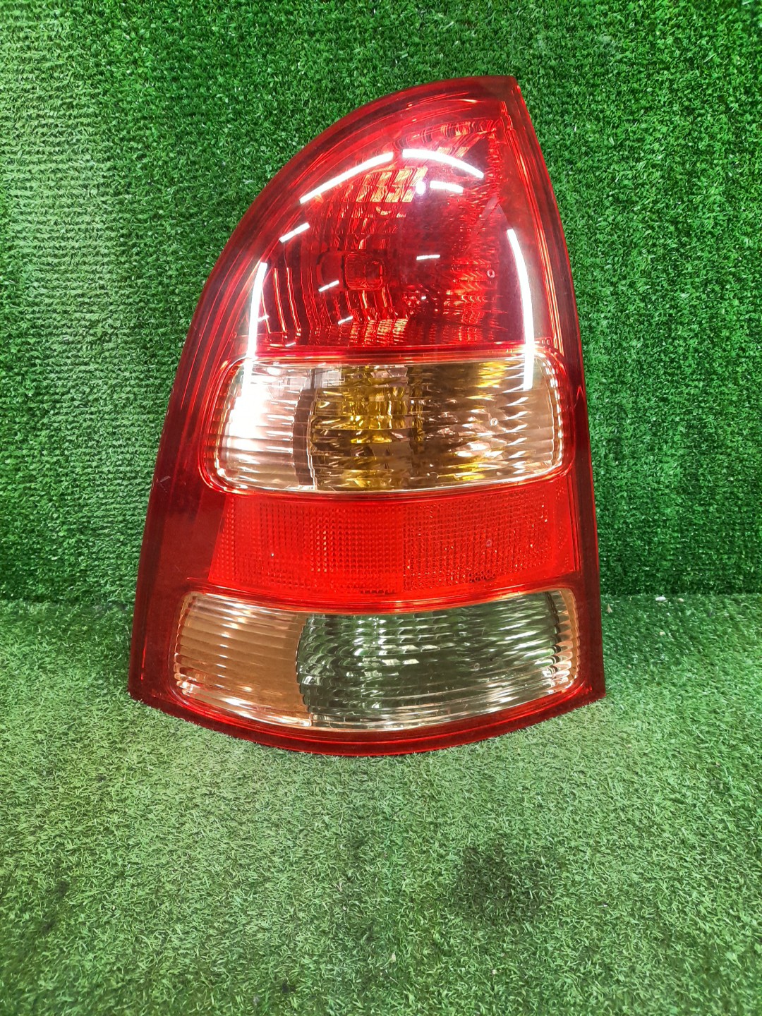 Стоп-сигнал левый задний TOYOTA COROLLA FIELDER NZE121G, ZZE123G, ZZE124G, ZZE122G, NZE124G 1 ракурс