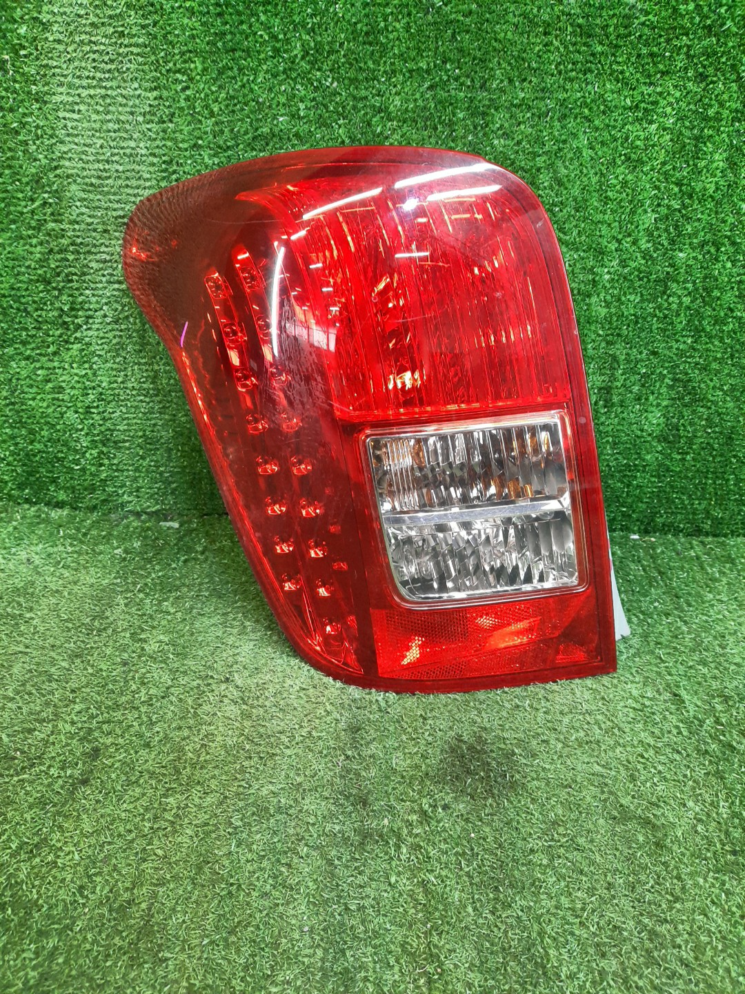 Стоп-сигнал левый задний TOYOTA COROLLA FIELDER, FIELDER ZRE144G, ZRE142G, NZE144G, NZE141G 1 ракурс