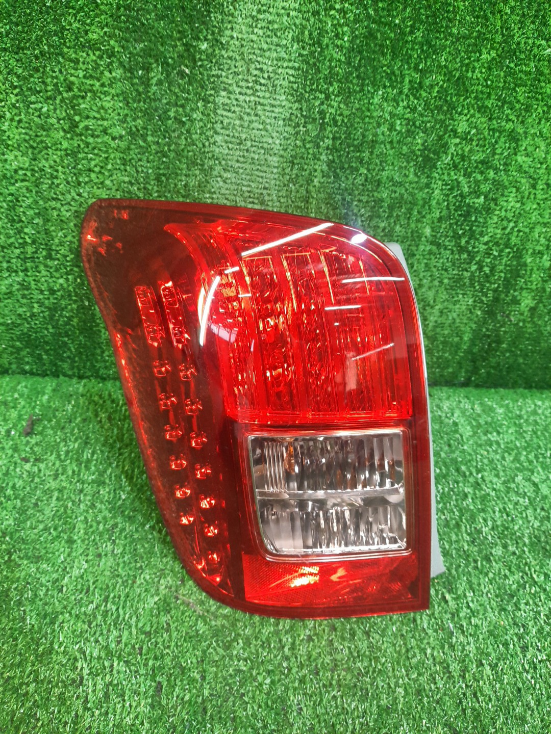 Стоп-сигнал левый задний TOYOTA COROLLA FIELDER, FIELDER ZRE144G, ZRE142G, NZE144G, NZE141G 1 ракурс