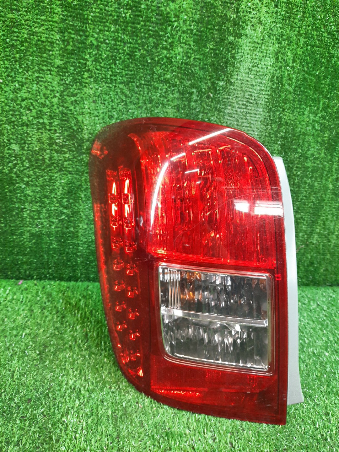 Стоп-сигнал левый задний TOYOTA COROLLA FIELDER, FIELDER ZRE144G, ZRE142G, NZE144G, NZE141G 1 ракурс