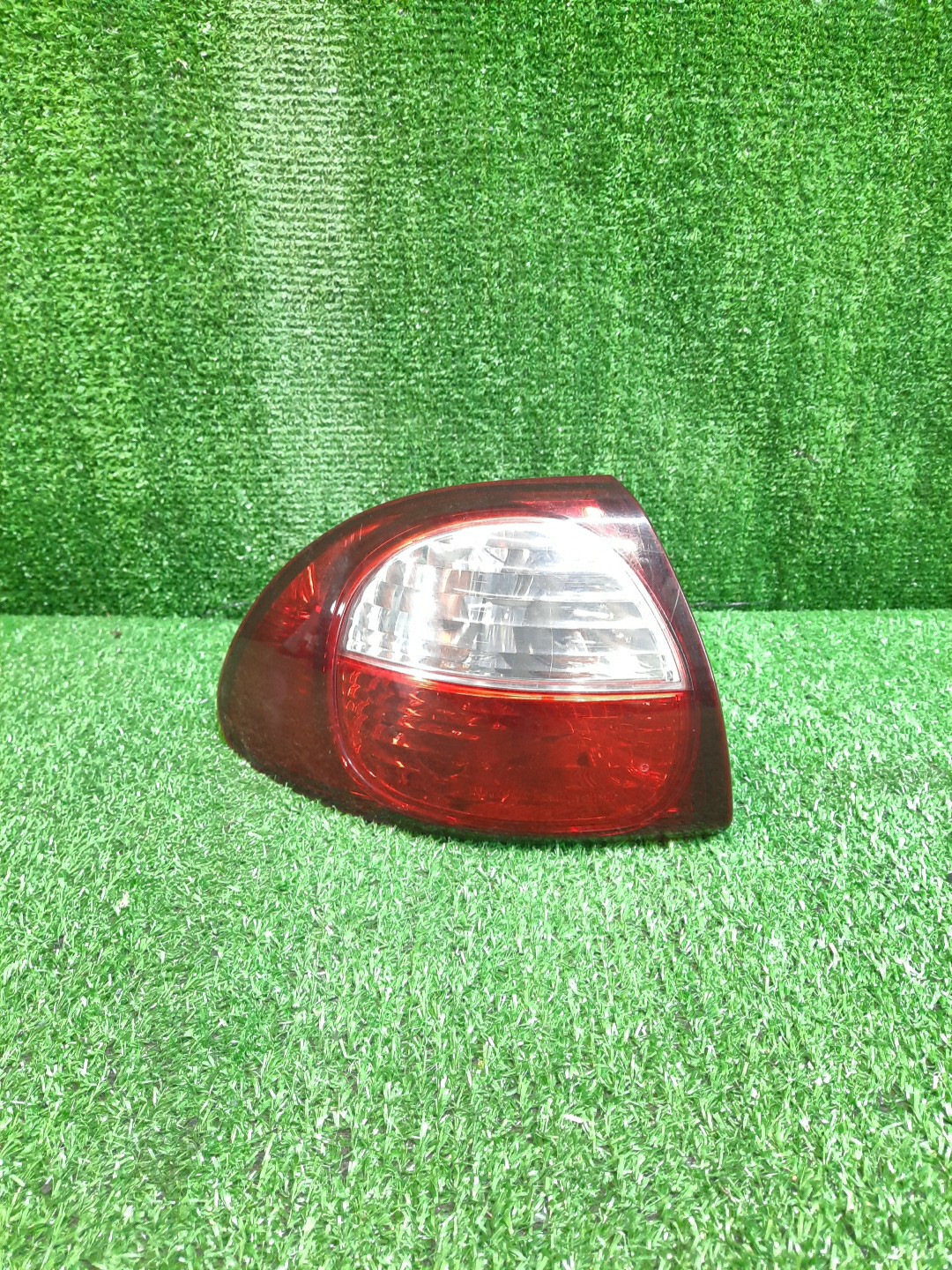 Стоп-сигнал левый задний TOYOTA CALDINA ST215W, ST210G, ST215G, CT216, ST210, AT211, ST215, CT216G, AT211G 1 ракурс