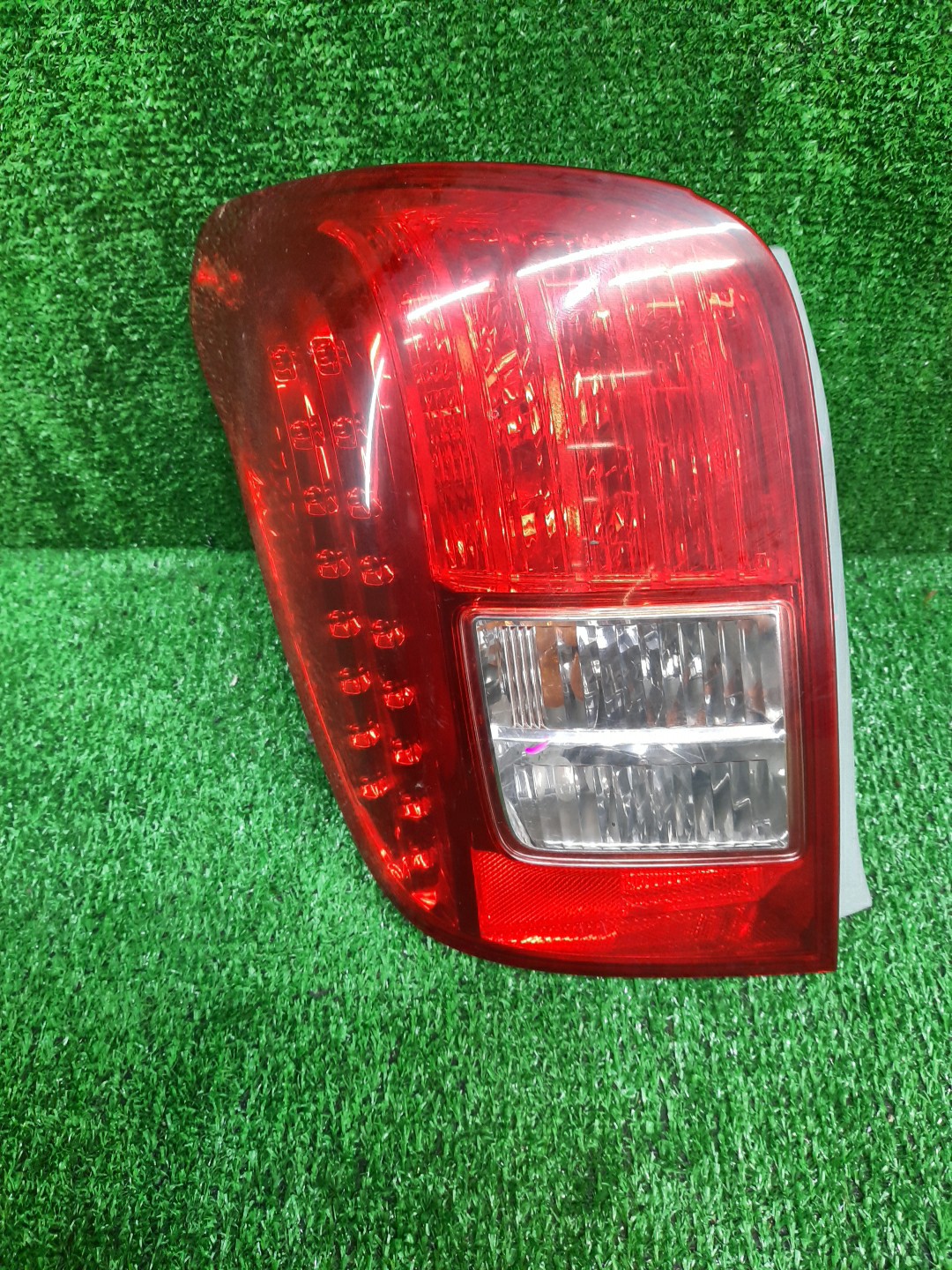 Стоп-сигнал левый задний TOYOTA COROLLA FIELDER, FIELDER ZRE144G, ZRE142G, NZE144G, NZE141G 1 ракурс