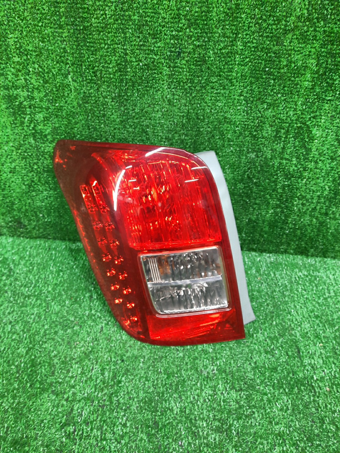 Стоп-сигнал левый задний TOYOTA COROLLA FIELDER, FIELDER ZRE144G, ZRE142G, NZE144G, NZE141G 1 ракурс