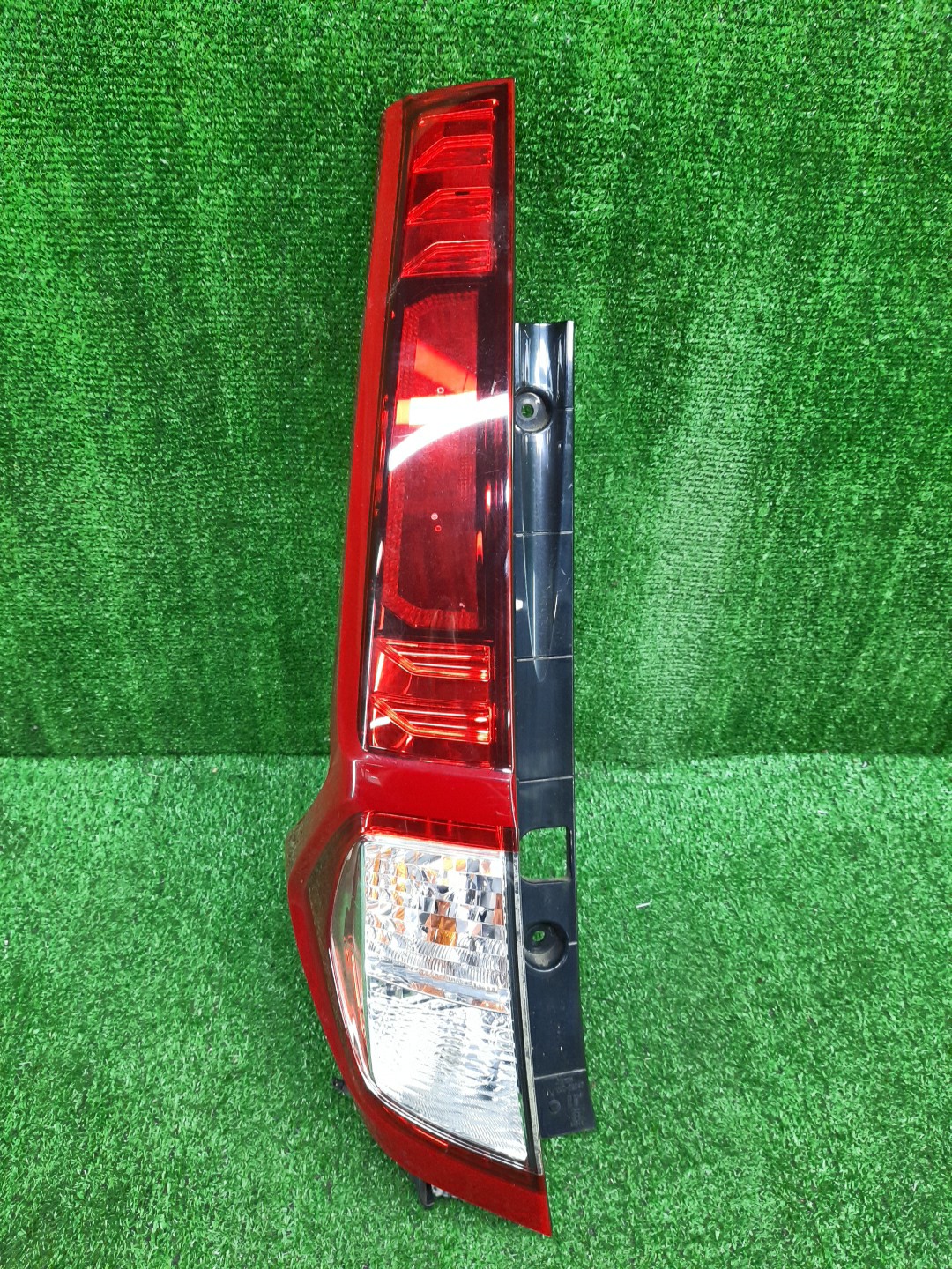 Стоп-сигнал левый задний TOYOTA THOR, JUSTY, TANK, ROOMY M910S, M900S, M900F, M910F, M910A, M900A 1 ракурс
