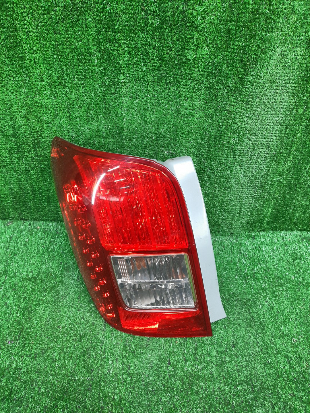 Стоп-сигнал левый задний TOYOTA COROLLA FIELDER, FIELDER ZRE144G, ZRE142G, NZE144G, NZE141G 1 ракурс