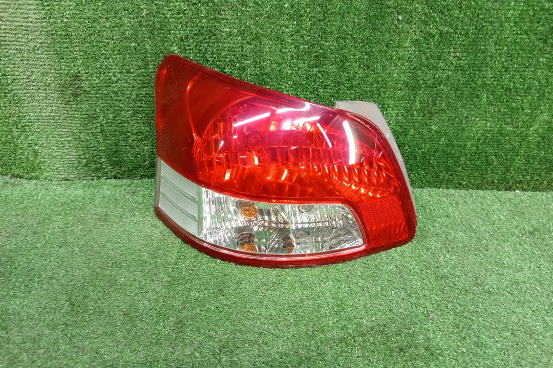 Стоп-сигнал левый задний TOYOTA BELTA NCP96, KSP90, KSP92, SCP92 1 ракурс