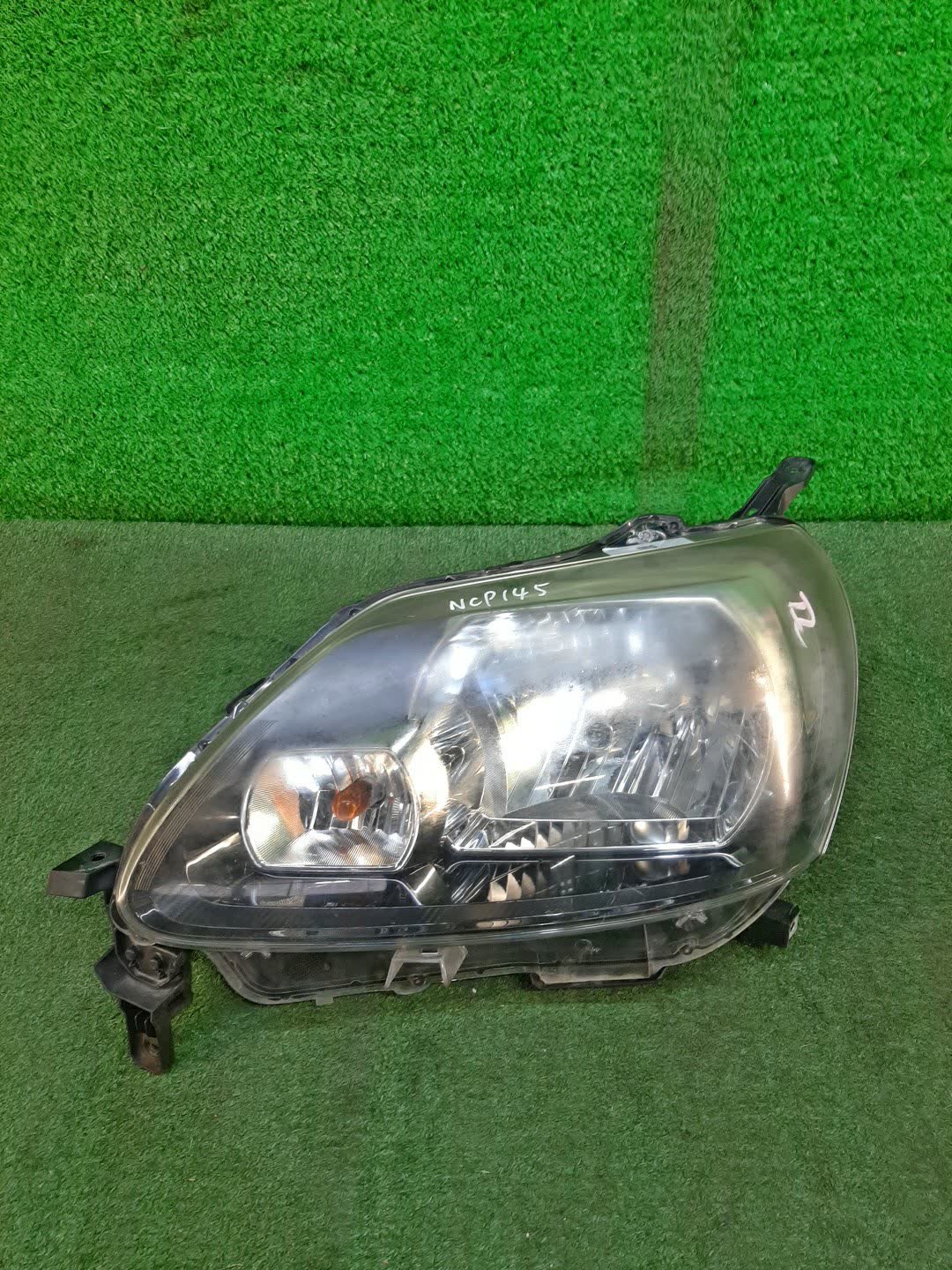 Фара левая передняя TOYOTA PORTE NCP141, NSP140, NSP141, NCP145 1 ракурс