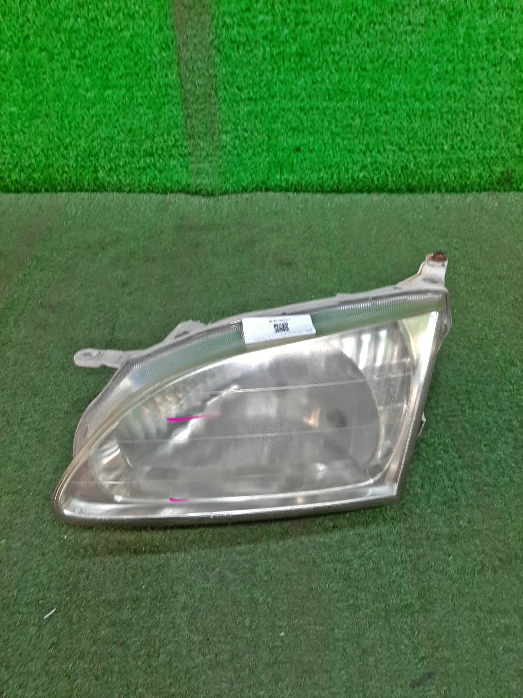 Фара левая передняя TOYOTA COROLLA SPACIO AE111N 1 ракурс Фара левая передняя TOYOTA COROLLA SPACIO AE111N 1 ракурс