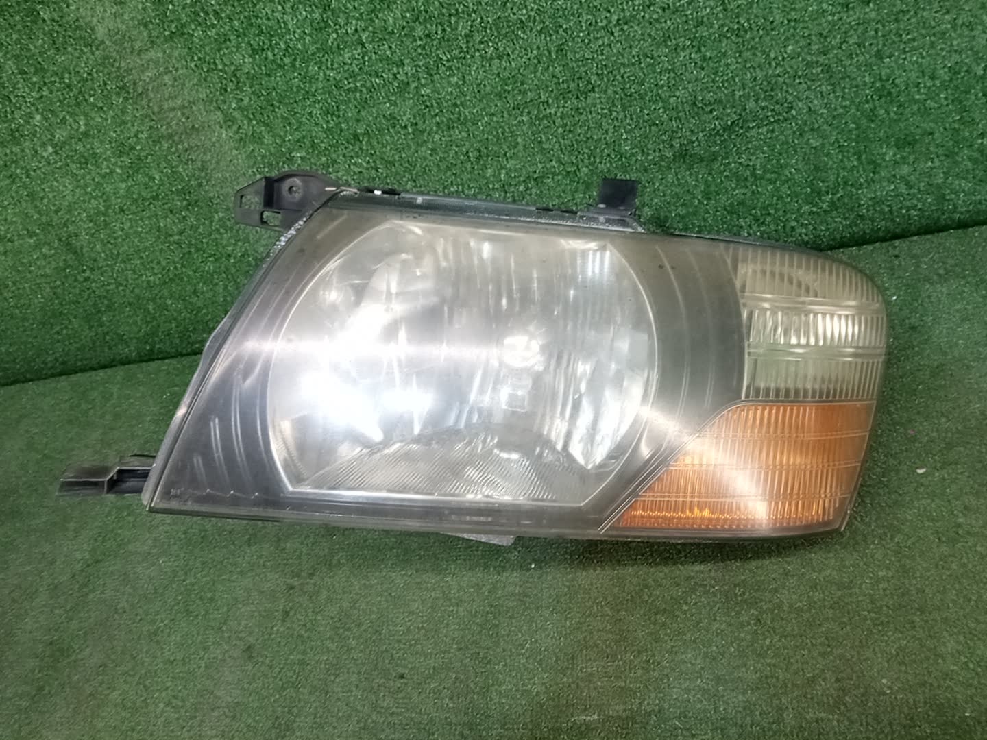Фара левая передняя MITSUBISHI PAJERO V75W, V65W, V78W, V73W, V77W, V63W, V68W 1 ракурс