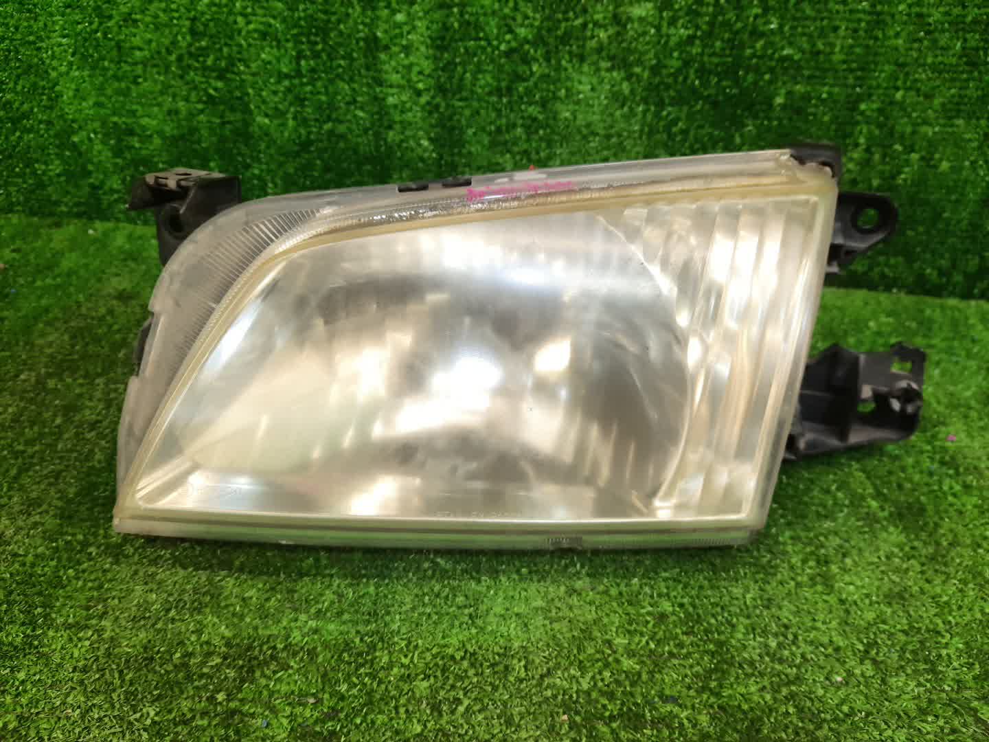 Фара левая передняя MAZDA DEMIO DW3W, DW5W 1 ракурс