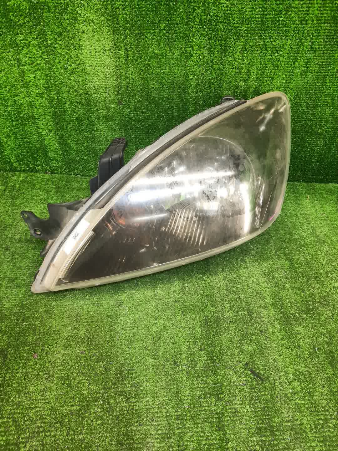 Фара левая передняя MITSUBISHI LANCER CEDIA, LANCER CS3W, CS9W, CS9A, CS1A, CS2A, CS2W, CS5W, CS5A, CS3A, CS6A, CS2V 1 ракурс