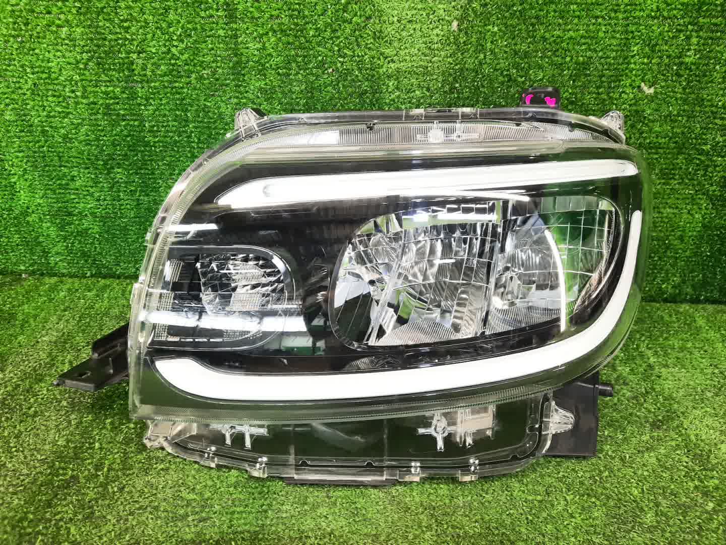 Фара левая передняя DAIHATSU TANTO LA650S 1 ракурс