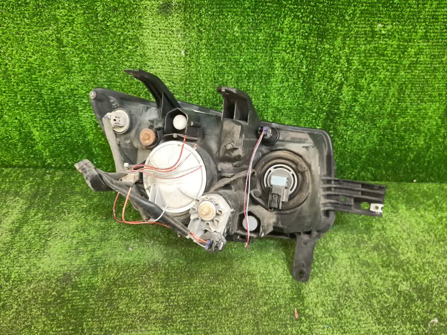 Фара левая передняя TOYOTA BB QNC20, QNC21, QNC25 2 ракурс