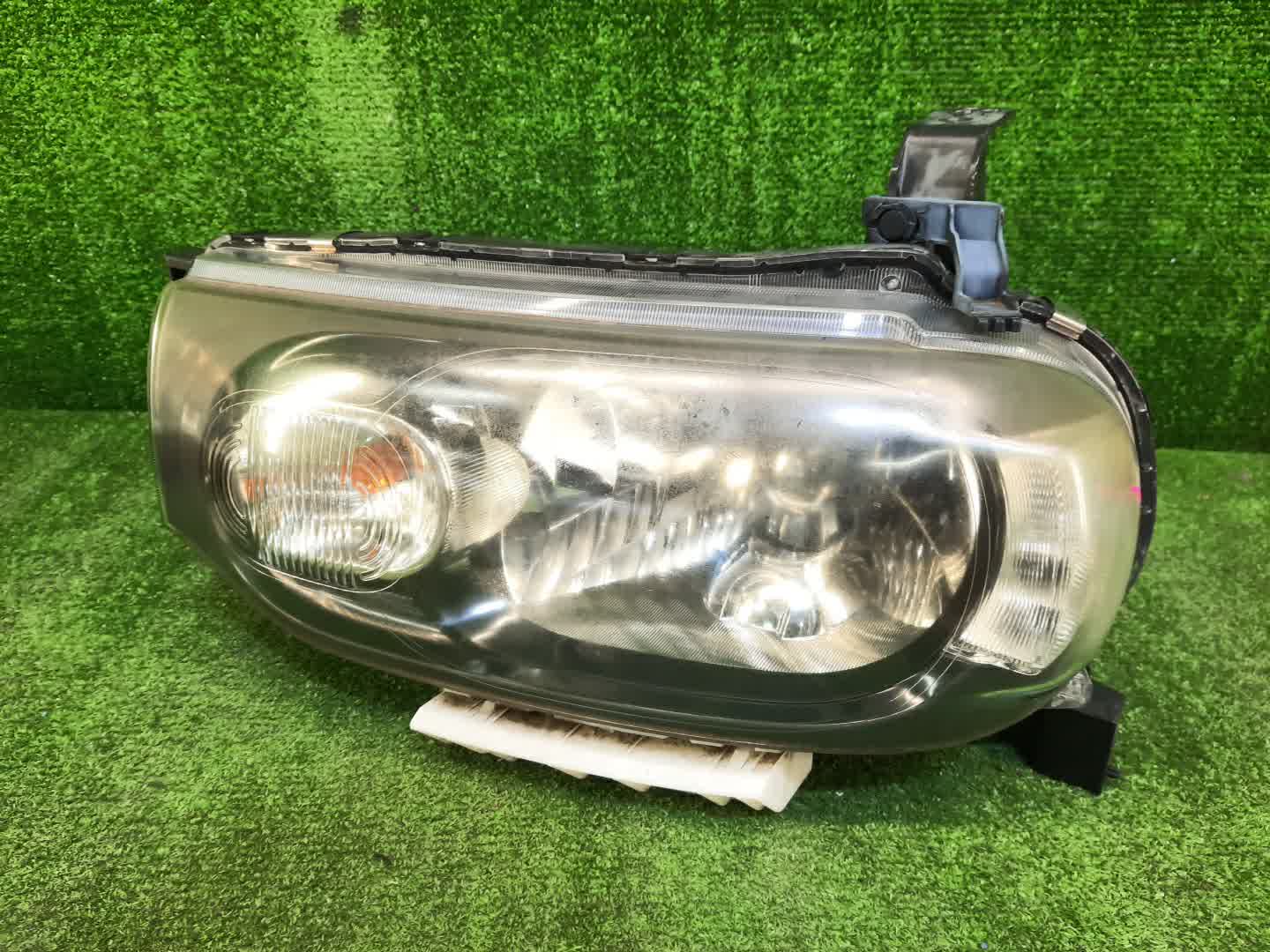 Фара левая передняя NISSAN CUBE Z12 1 ракурс