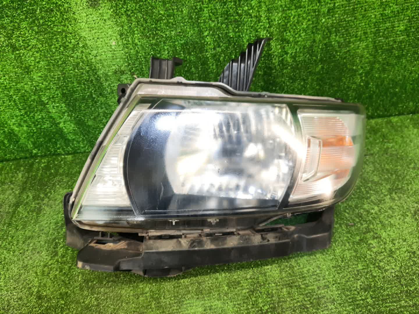 Фара левая передняя HONDA MOBILIO SPIKE GK1, GK2 1 ракурс